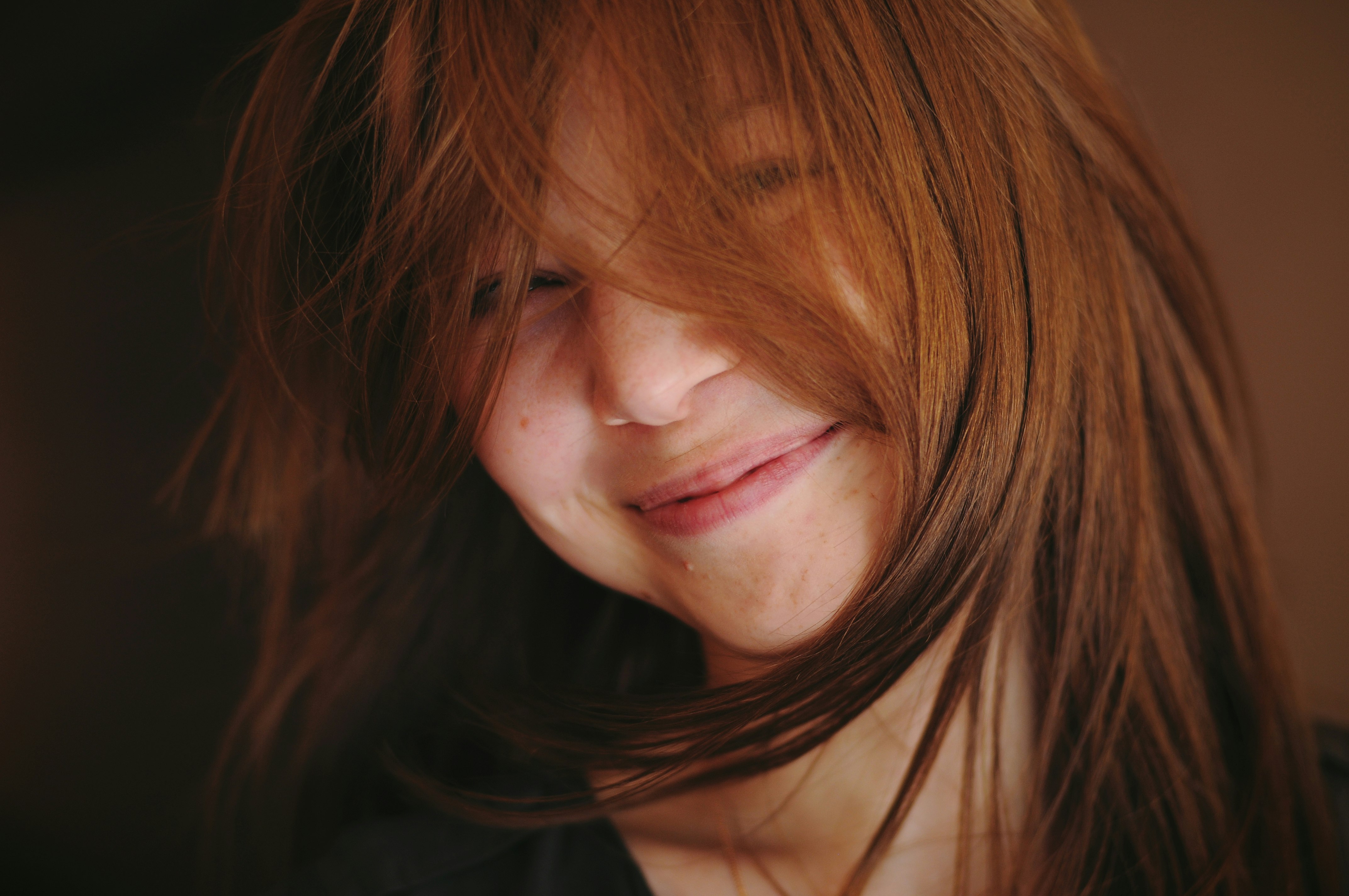 smiling woman in black shirt